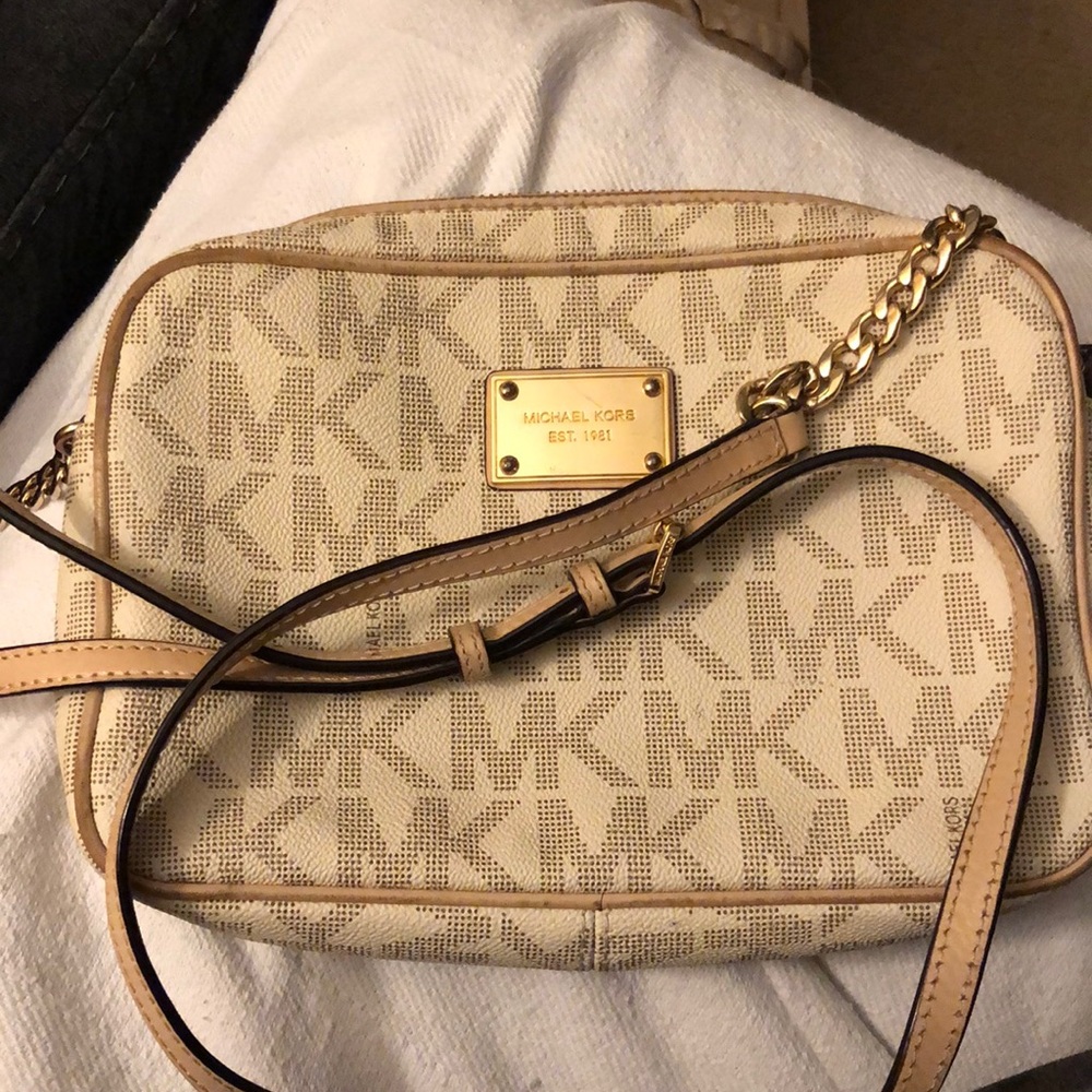 Michael Kors medium logo crossbody bag with matching wallet.